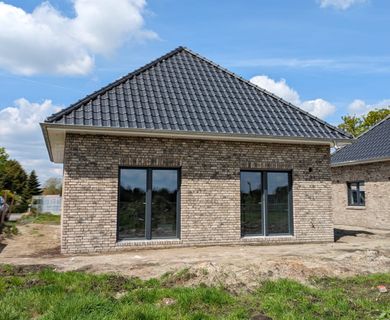 Modernes KFW-40-Bungalow-Neubauprojekt mit idyllischem Ausblick – Zentral in Moormerland gelegen